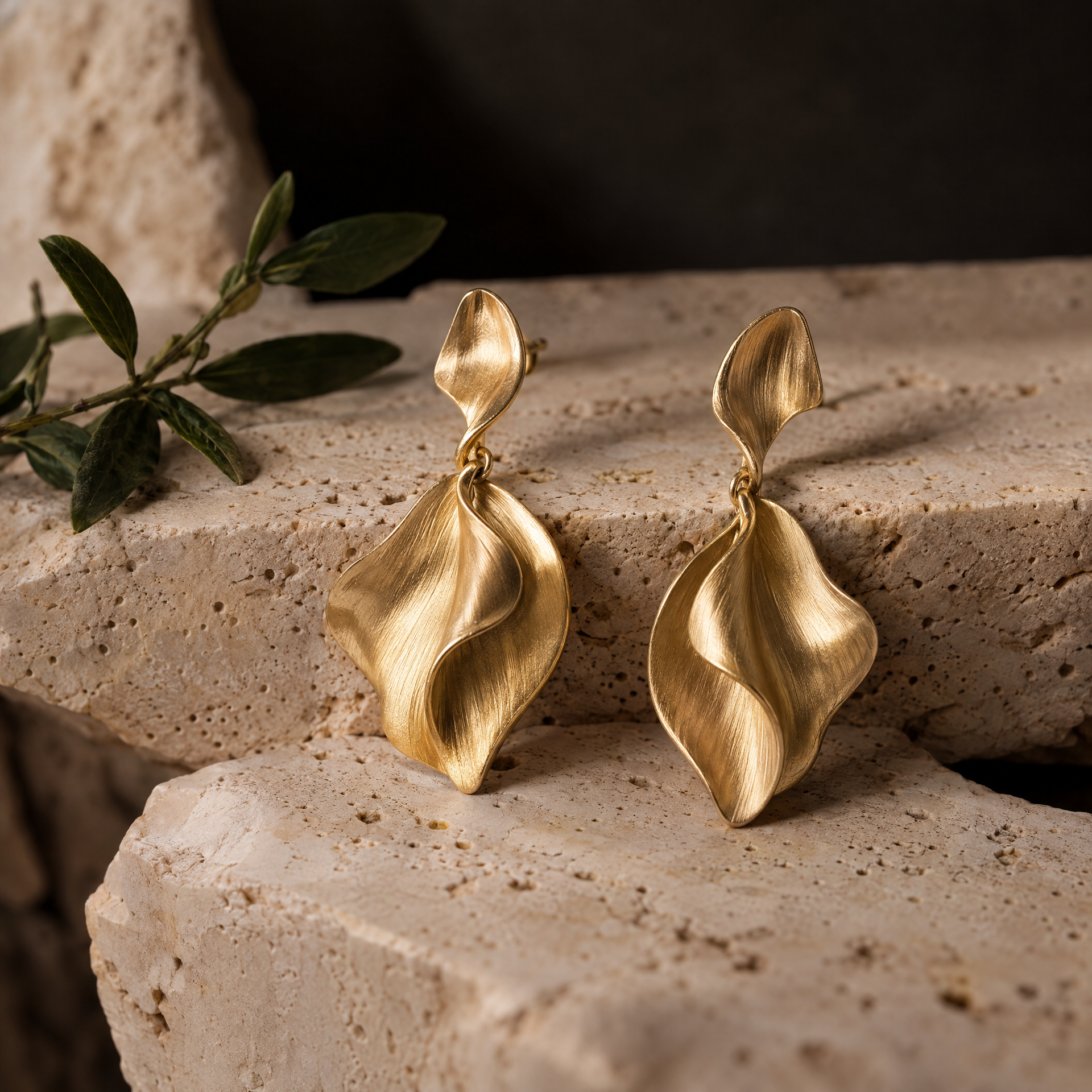 Handcrafted gold earrings
